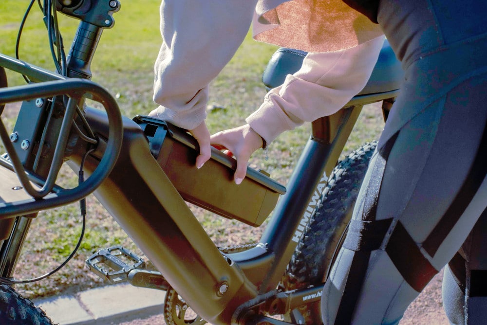 Removing a battery pack from an ebike.